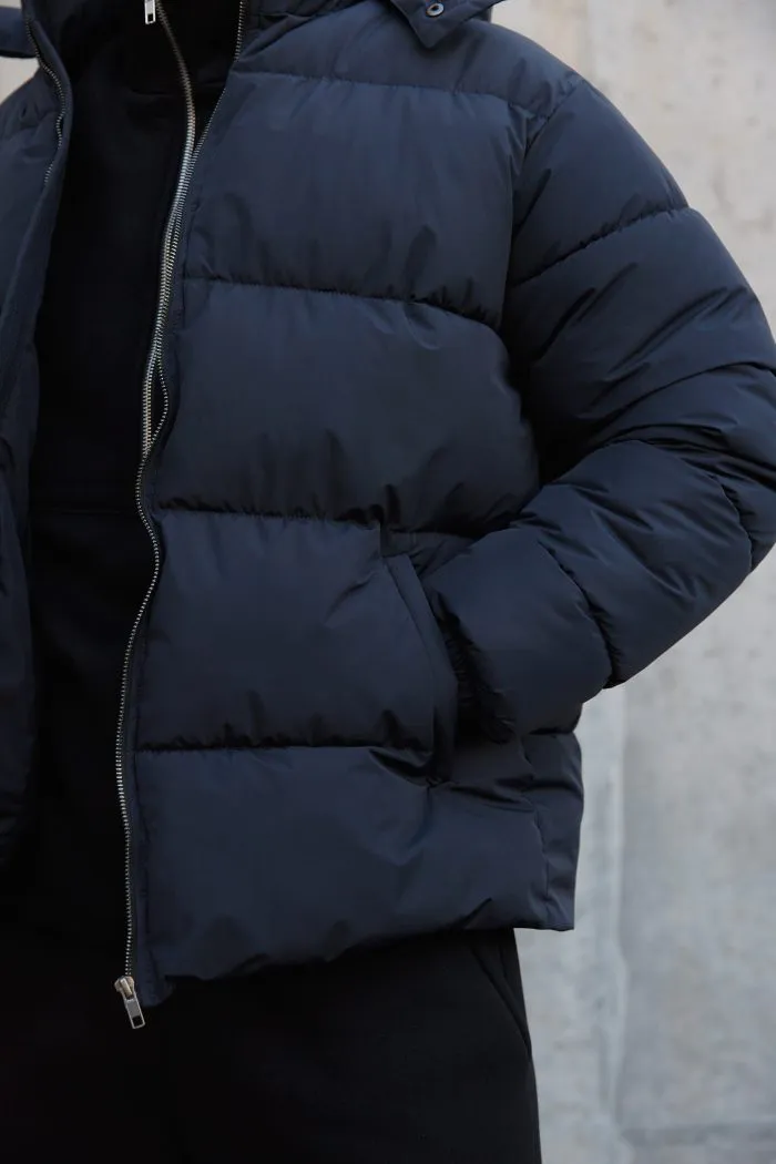 Пуховик чоловічий з капюшоном темно-синій Фото - 4