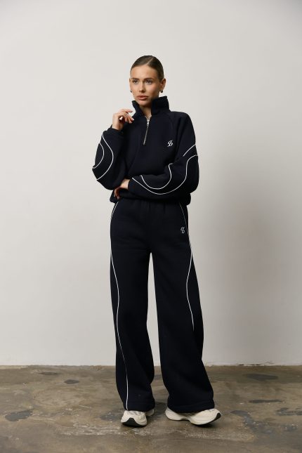 Костюм жіночий з хвилястим лампасом темно-синій