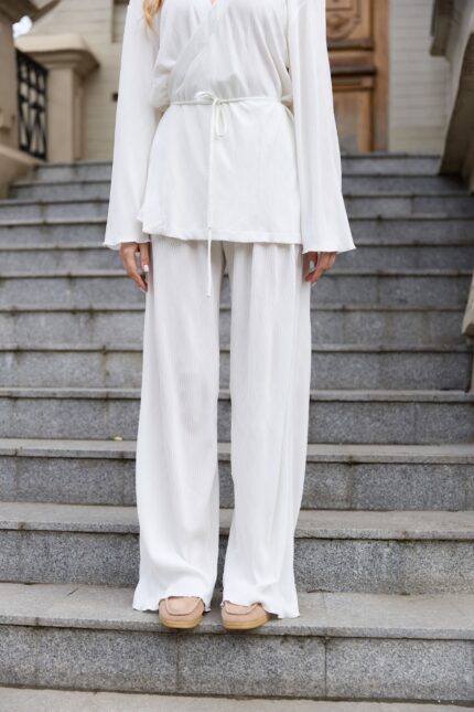 Штани палаццо плісе молочні